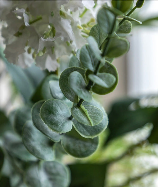 Artificial flowers in vase