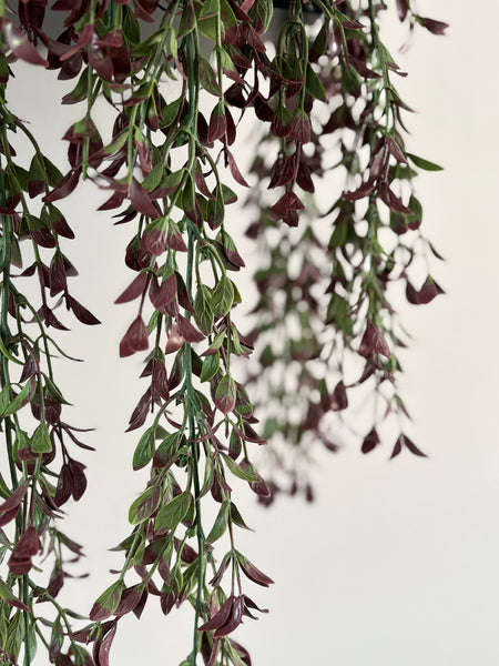 Burgundy artificial trailing plants