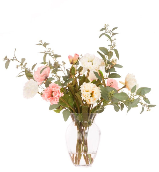 Luxury faux flower arrangement in vase with pink poppy and eucalyptus stems